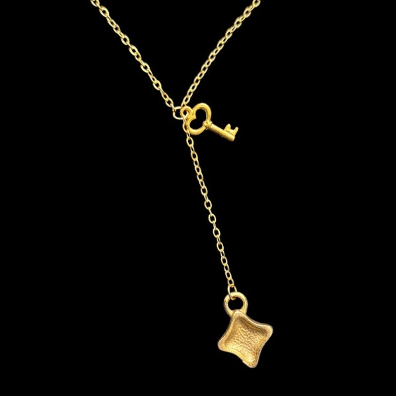 Gold Toned Key & Abstract Diamond Charm Layered Drop Pendant Necklace